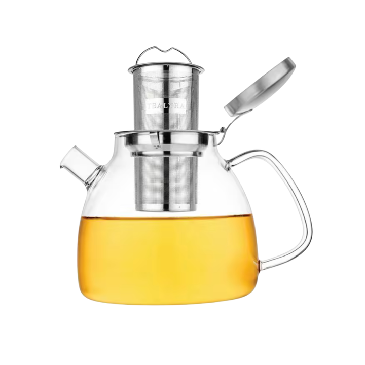 Clear glass teapot with fine mesh infuser on a white background