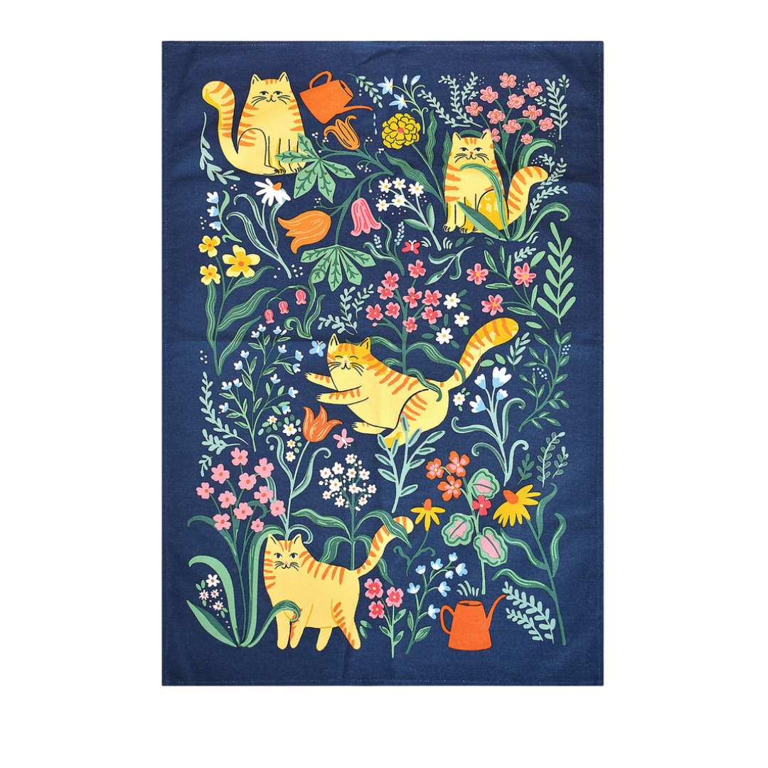 Navy blue towel with colorful cat and floral design