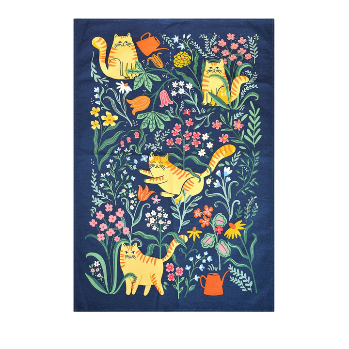 Navy blue towel with colorful cat and floral design
