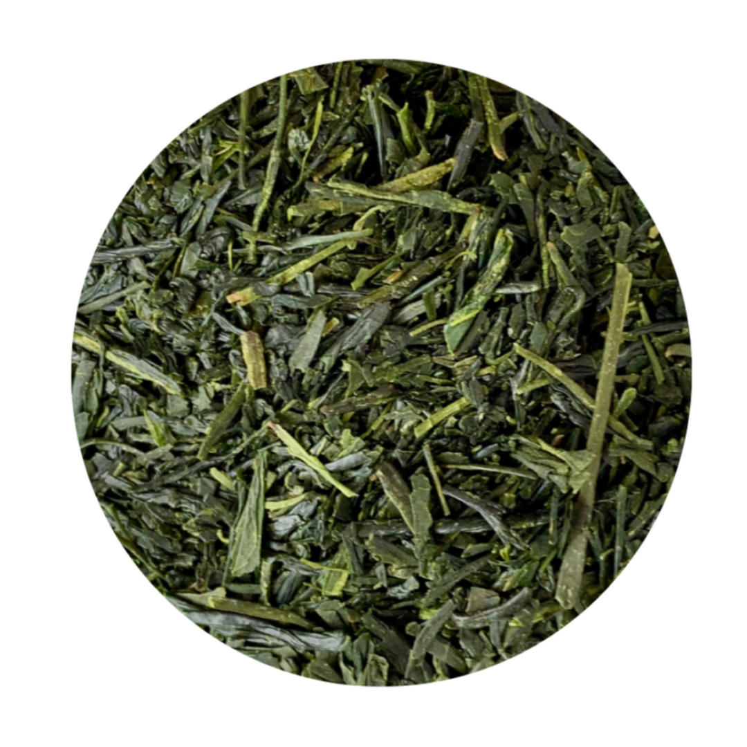 A pile of fresh green tea leaves.