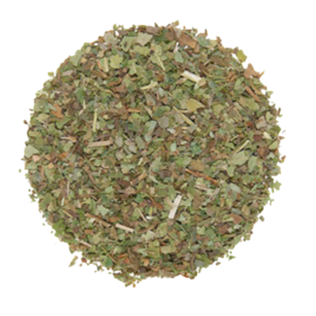 Round pile of dried green strawberry leaf herbs