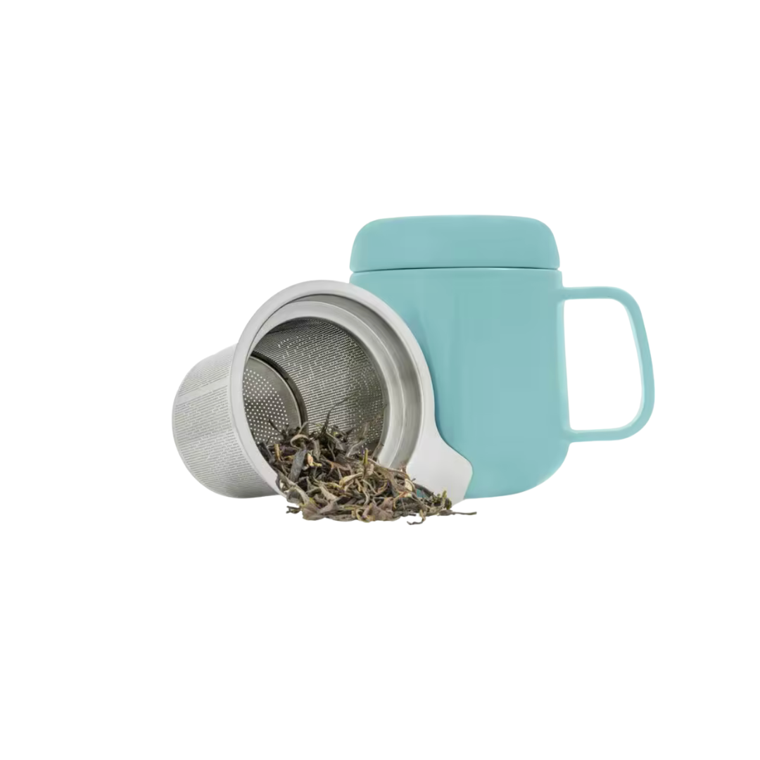 Tea infuser with a turquoise porcelain mug with lid and on a white background