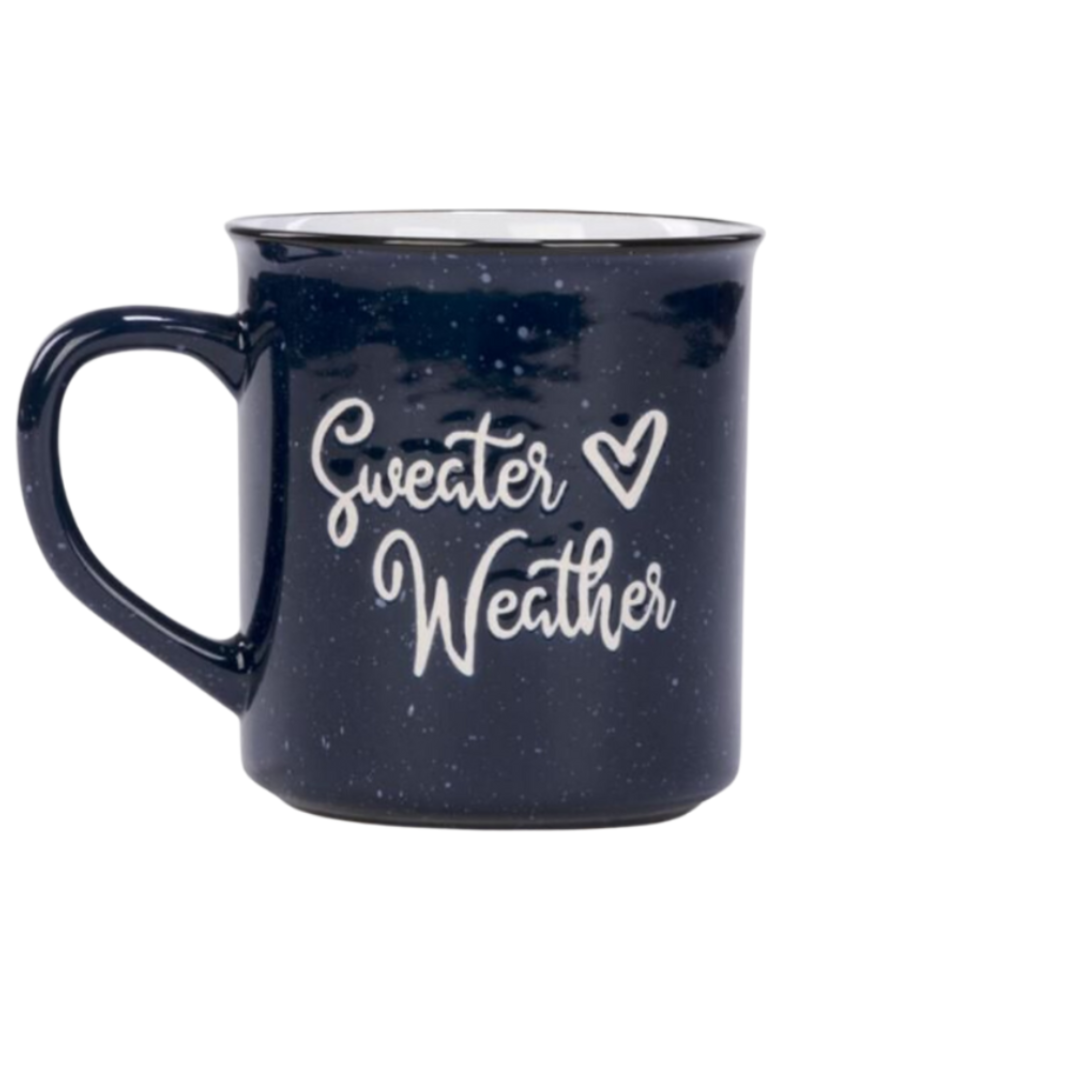 Navy blue ceramic mug with 'Sweater Weather' text on a white background
