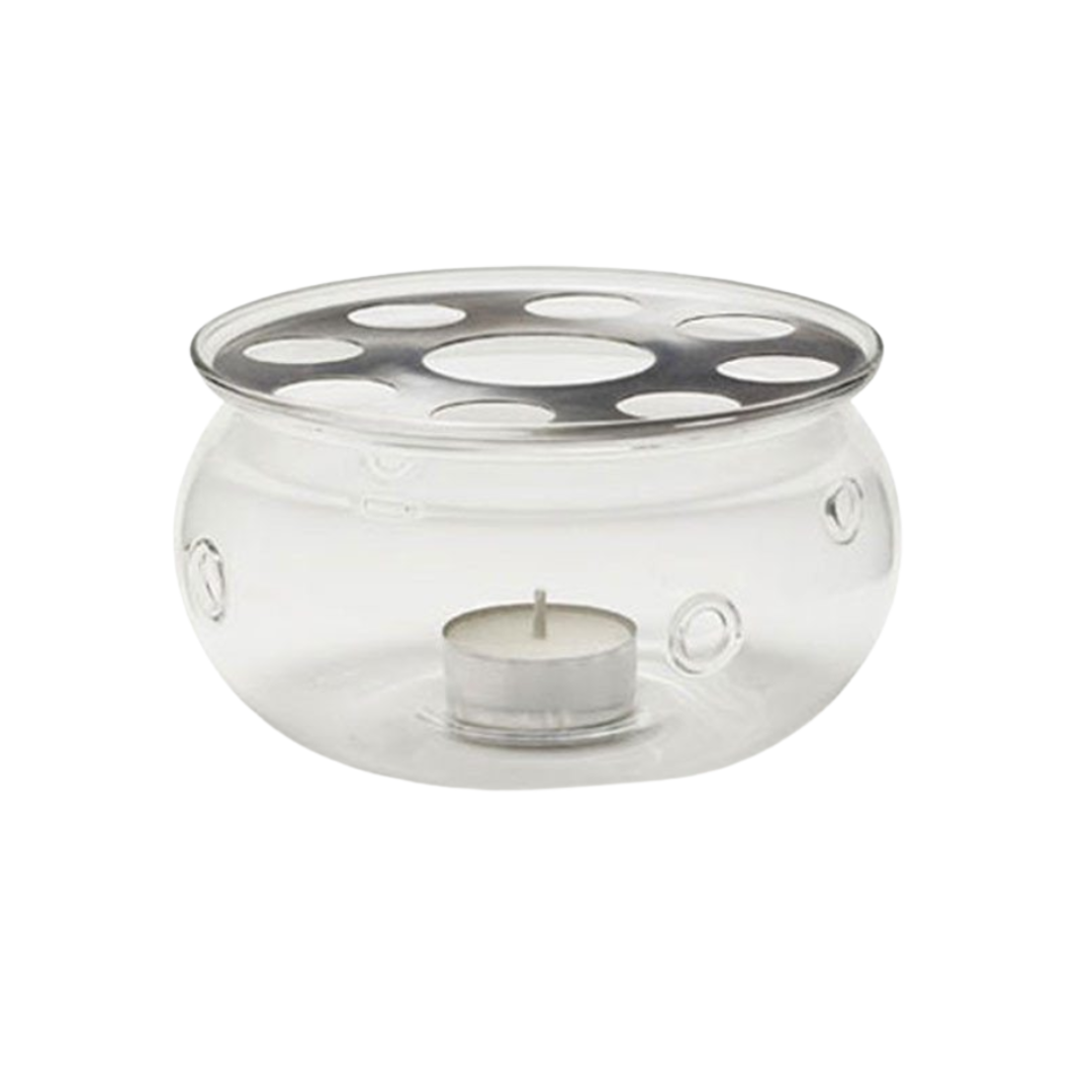 Clear glass candle holder with metal lid on a white background