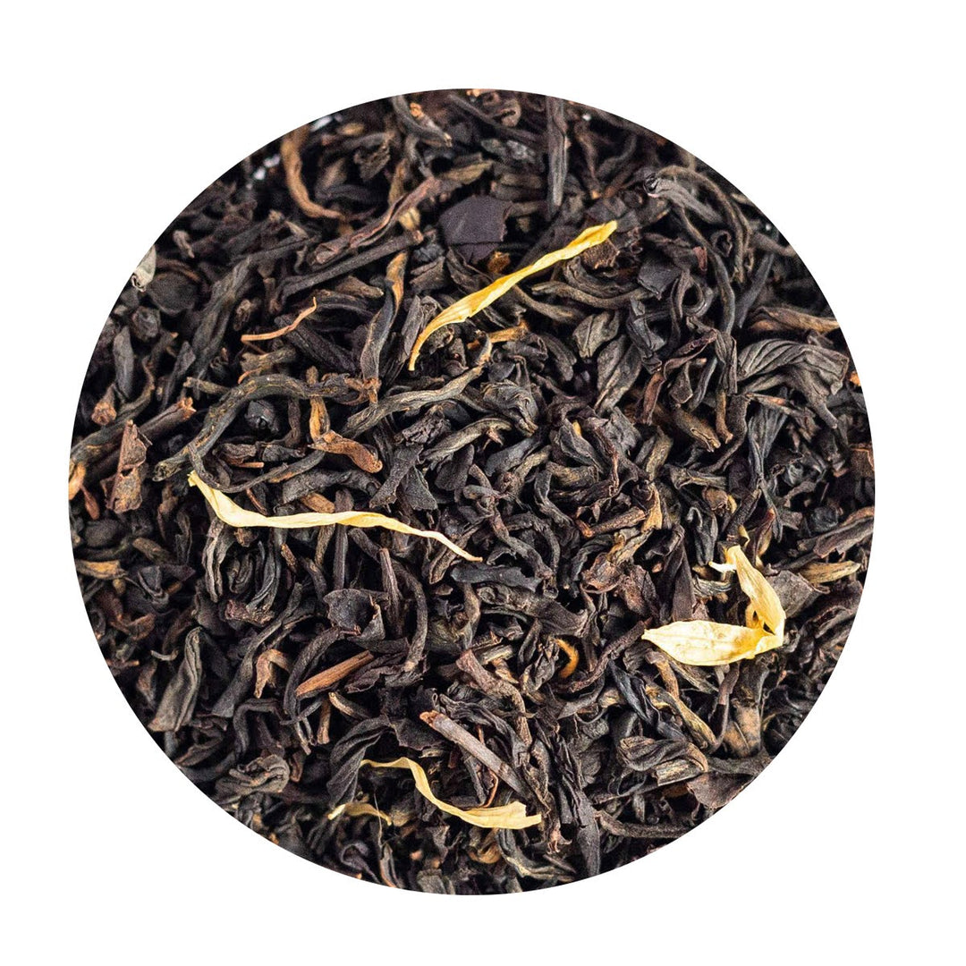 Loose Leaf Black Tea and Pu'erh Tea with sunflower and calendula petals.